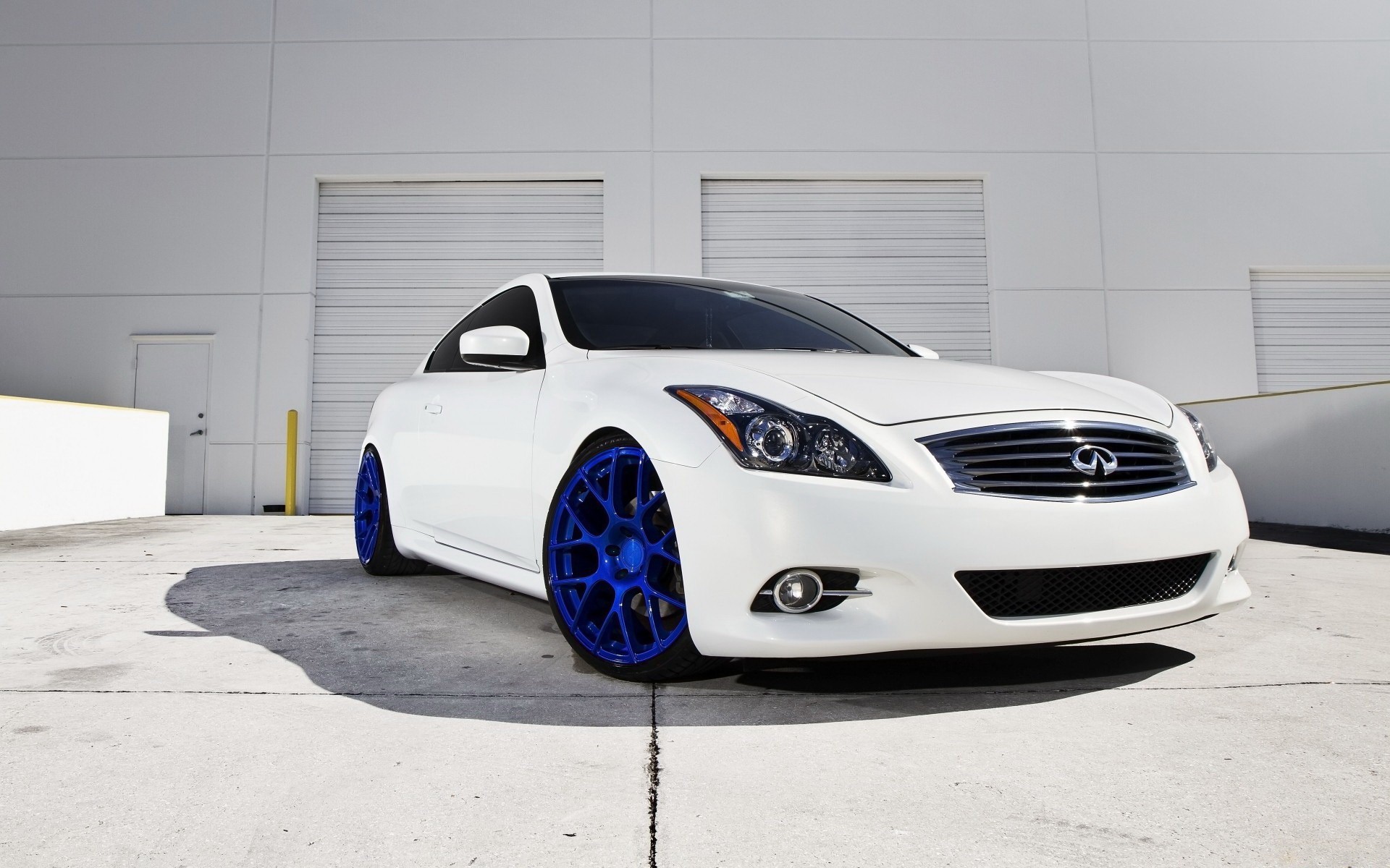 White car with a blue wheels wallpapers and images  wallpapers, pictures, photos