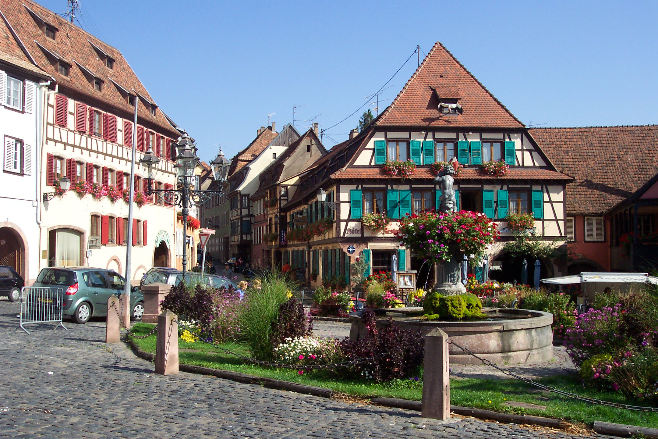 Fountain in the square in Alsace, France wallpapers and images - wallpapers, pictures, photos