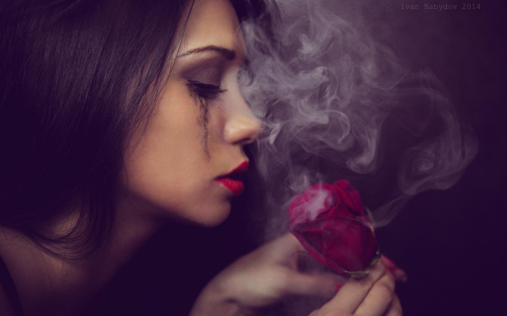 The girl looks at smoking rose wallpapers and images - wallpapers