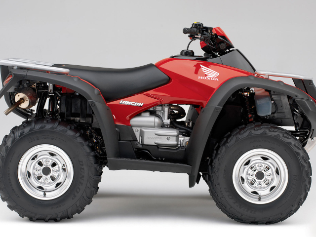 Красный Honda Rincon квадроцикл