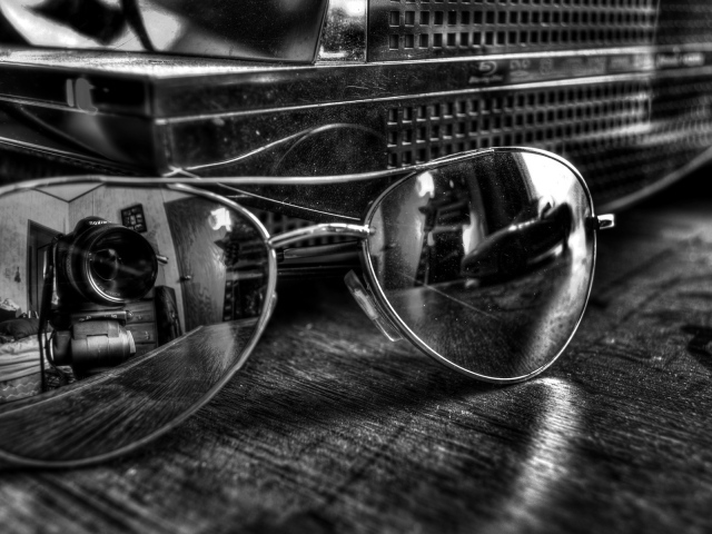 Объектив в отражении