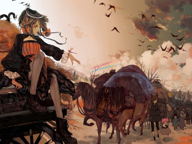 Девочка сидит на повозке