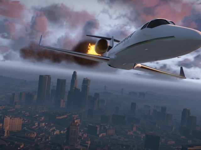 Самолет горит над городом