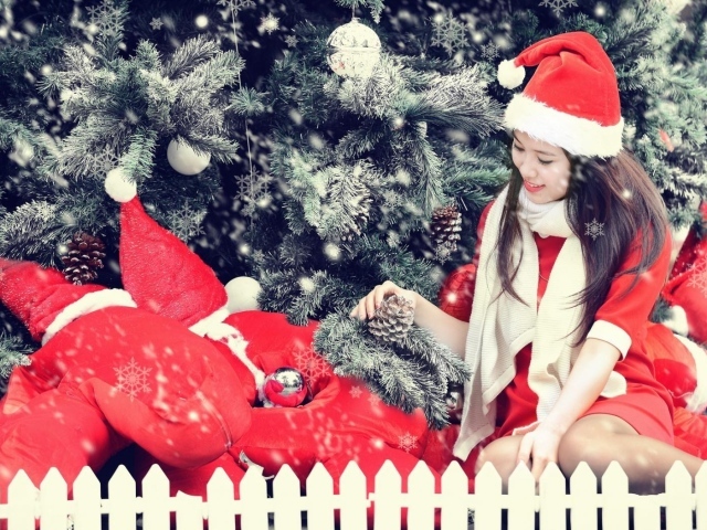 Девочка в костюме Санта клауса