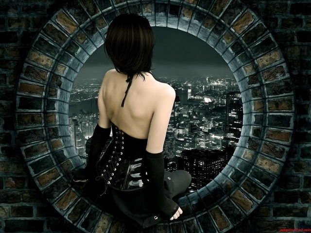 Девушка смотрит на город