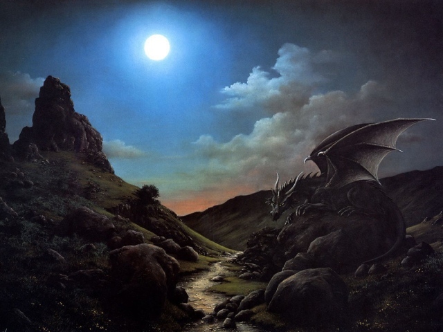 Дракон сидит на камне