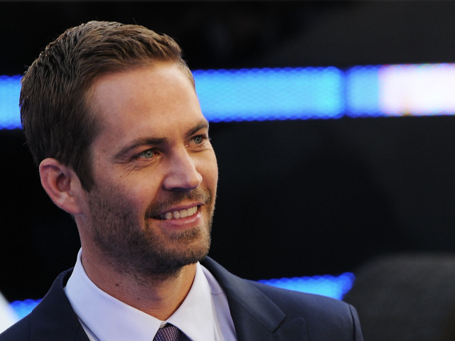 Актер Пол Уокер улыбается