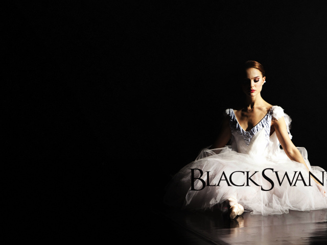Балерина в образе белого лебедя