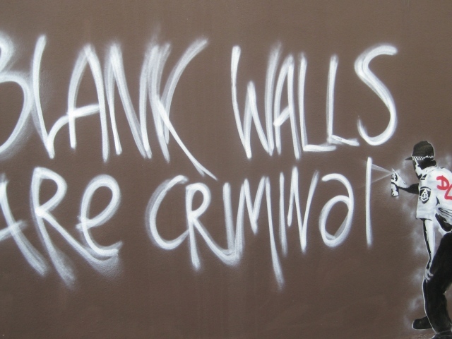 Граффити, полицейский нарушитель закона, художник Бэнкси