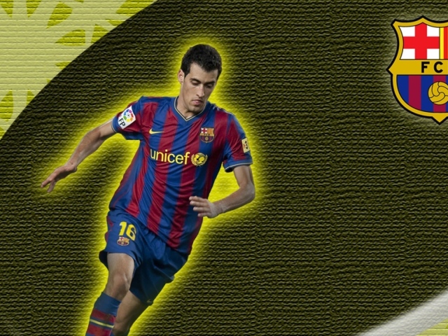 Футболист Барселоны Серхио Бускетс на желтом фоне