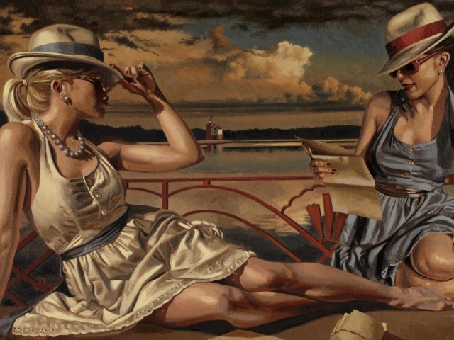 Девушки отдыхают на берегу озера