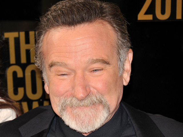 Актер Робин Уильямс улыбается