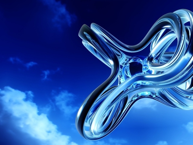 Стеклянная фигура на фоне неба
