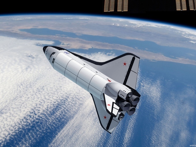 Космический корабль возвращается на Землю