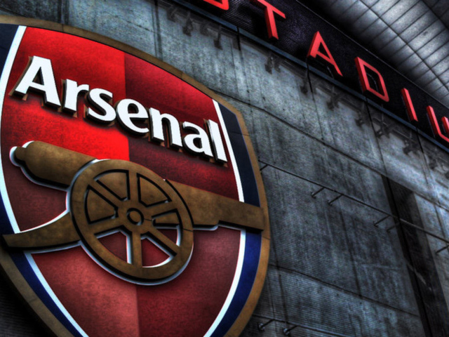 Арсенал логотип на стене