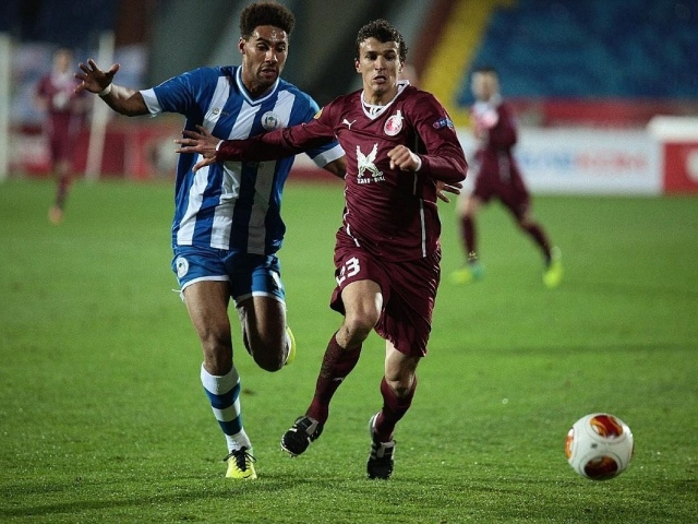 Роман Еременко полузащитник клуба Рубин на поле