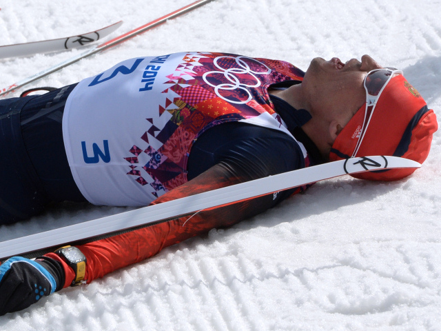 Российский лыжник Александр Легков обладатель золотой медали 