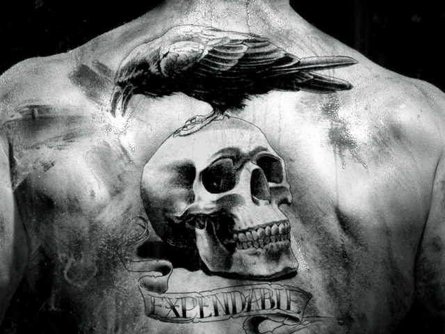 Тату череп на спине