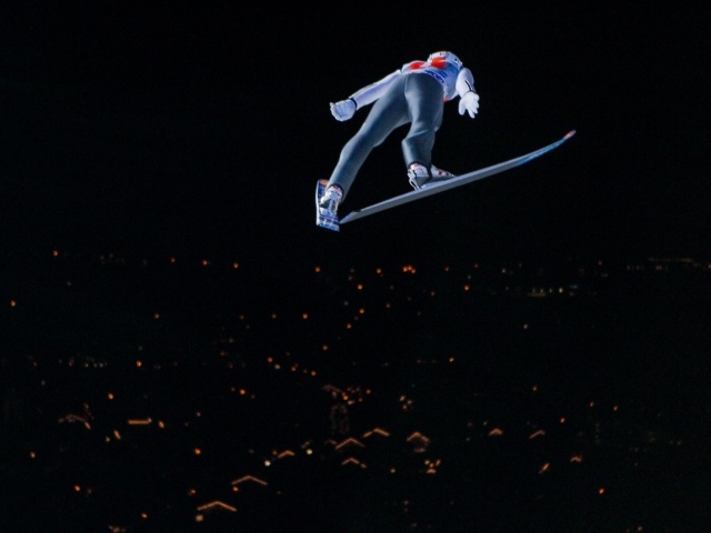 Обладатель серебряной медали в дисциплине прыжки на лыжах с трамплина  Томас Дитхарт на олимпиаде в Сочи