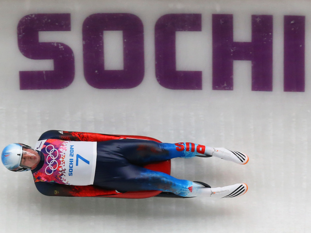 Обладатель двух серебряных медалей российский саночник Альберт Демченко на олимпиаде в Сочи