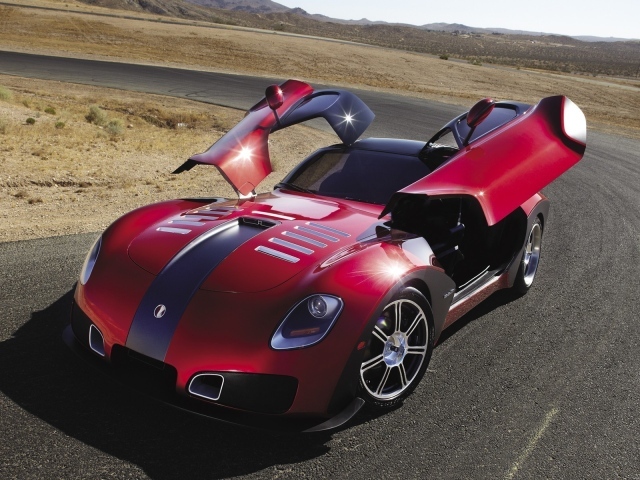 Красный автомобиль Devon GTX на повороте