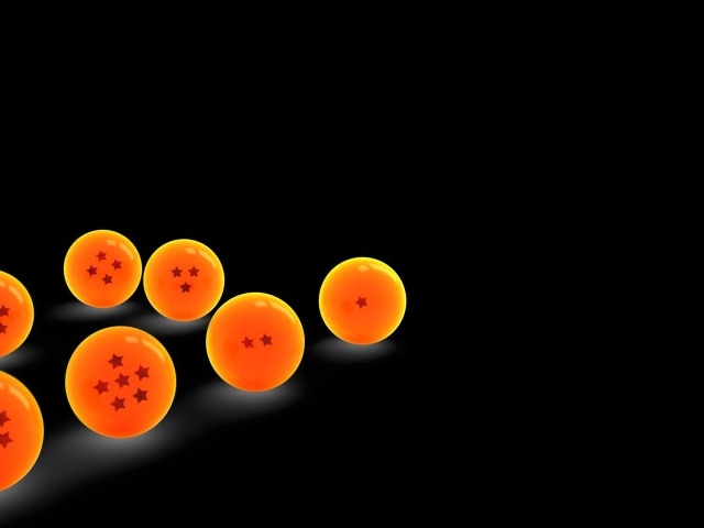 Оранжевые шары на черном фоне