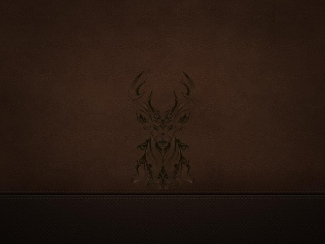 Силуэт оленя на коричневой коже