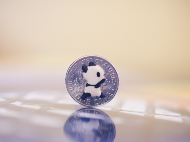 Панда на монете