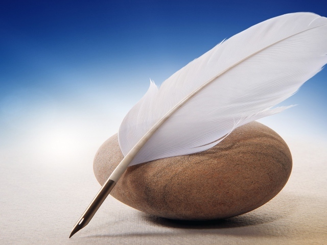 Перо для письма и морской камень