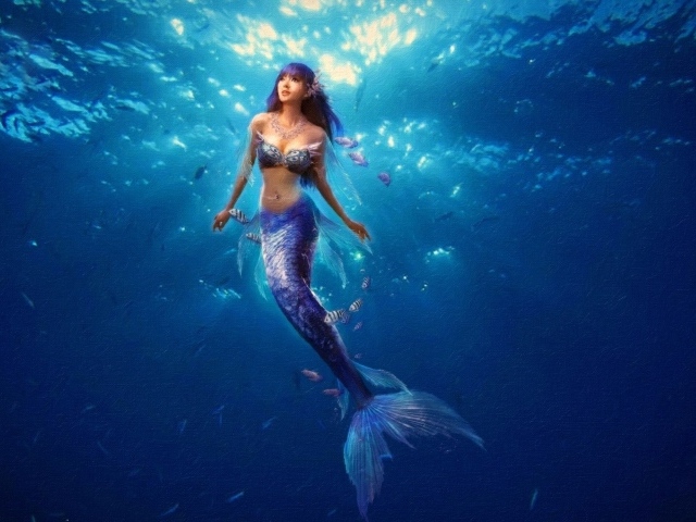 Русалка плывет к поверхности