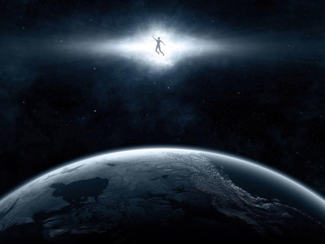 Человек в луче над планетой