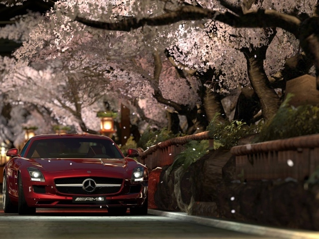 Красный Мерседес Gran Turismo под сенью сакуры