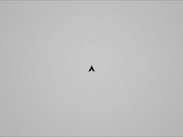 Маленький черный треугольник на сером фоне