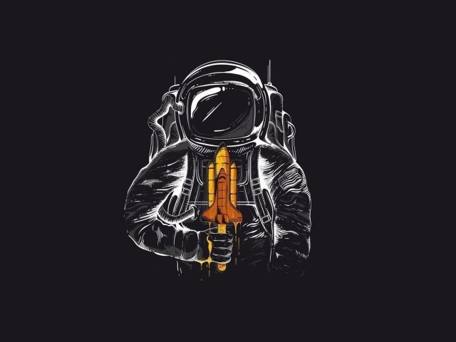 Астронавт с леденцом в форме Шаттла