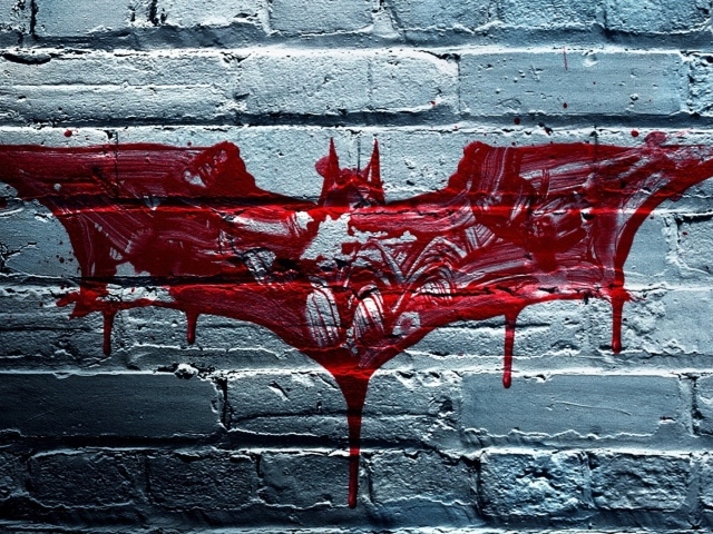 Кровавая летучая мышь на стене