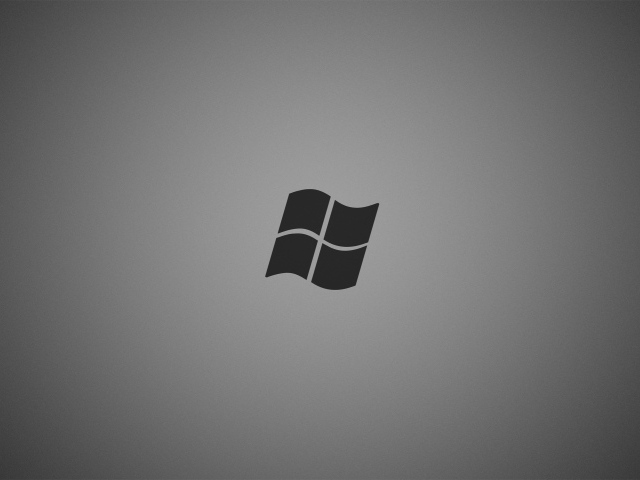 Серый логотип Майкрософт на сером фоне