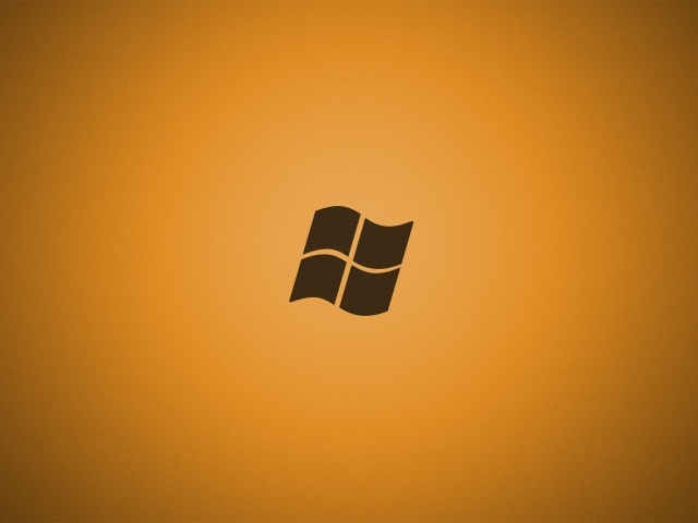 Серый логотип Майкрософт, оранжевый фон