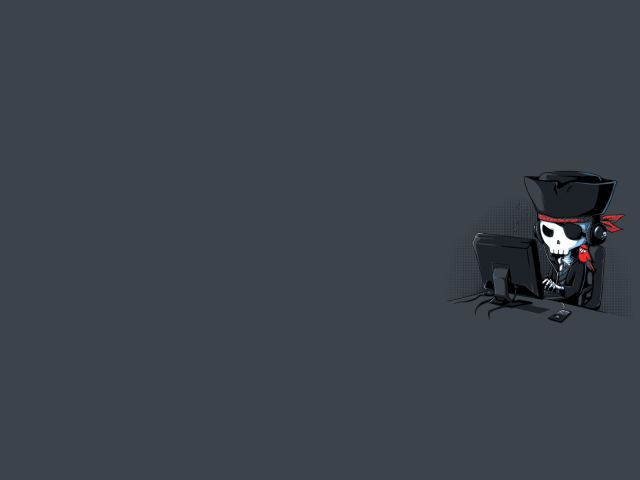 Пират за компьютером, серый фон