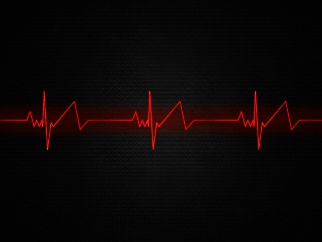 Красная нить пульса на черном фоне