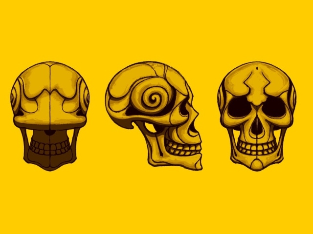 Черепа на желтом фоне