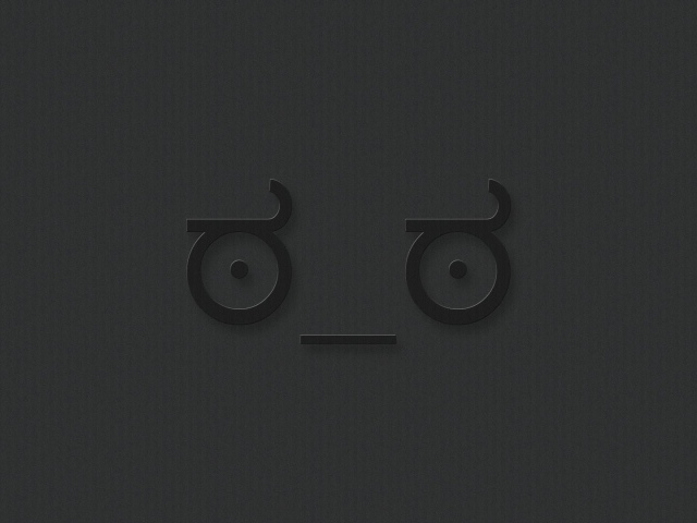 Серая мордочка на сером фоне