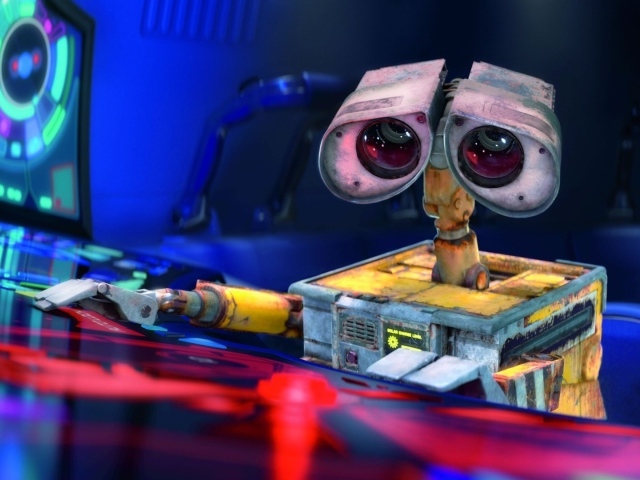 Робот WALL·E за пультом управления