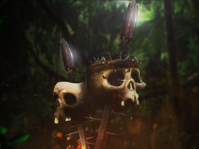Черепа на копьях в джунглях