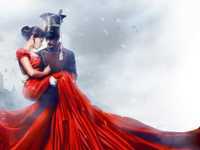 Улан держит на руках девушку в красном платье