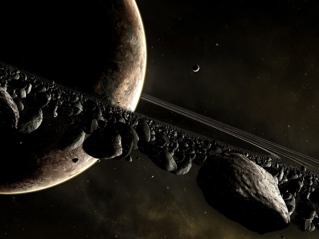 Черные камни в кольце Сатурна