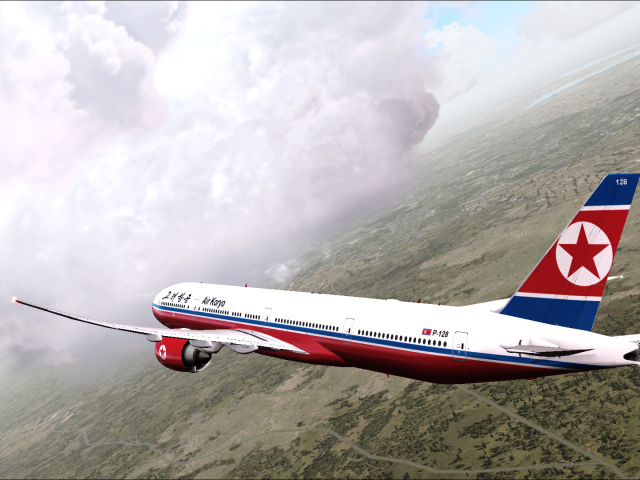 Самолет Boeing 777 авиакомпании Air Koryo  летит над землей 