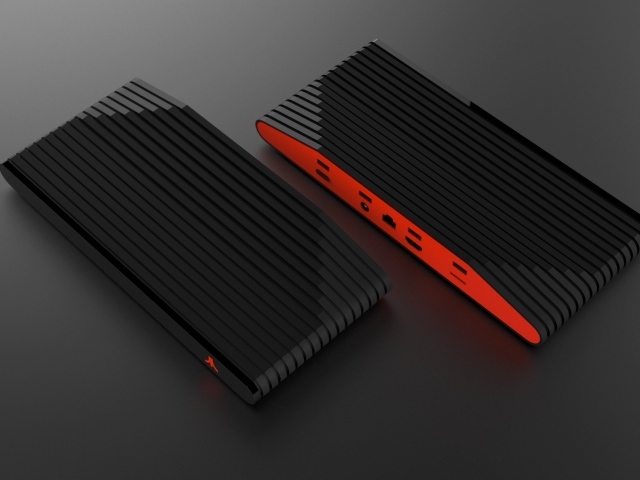 Новый игровой консоль Ataribox, 2018 на сером фоне