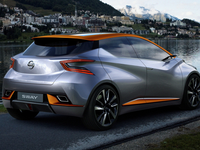 Серебристый электромобиль Nissan Sway 