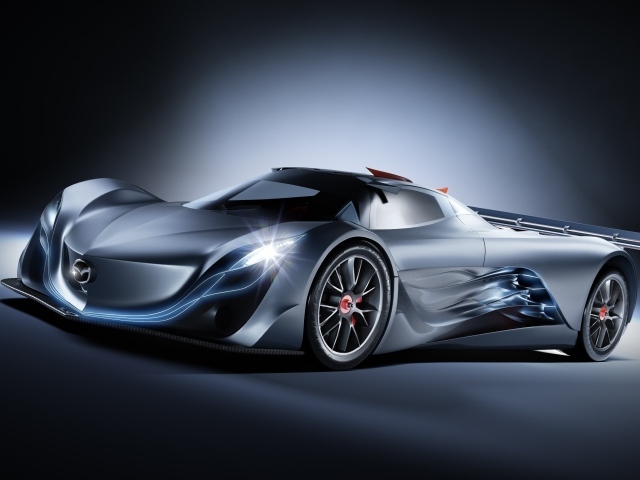 Спортивный автомобиль Mazda Furai на сером фоне