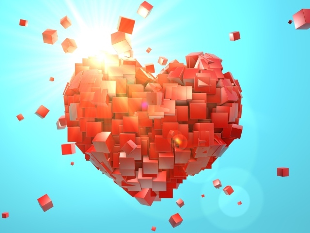 Сердце из красных кубиков на голубом фоне